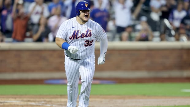 Mets DH Daniel Vogelbach celebrates a home run.
